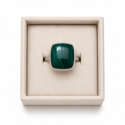 Cushion cut malachite sterling silver ring in a display box on a white background. - Clover's Charm