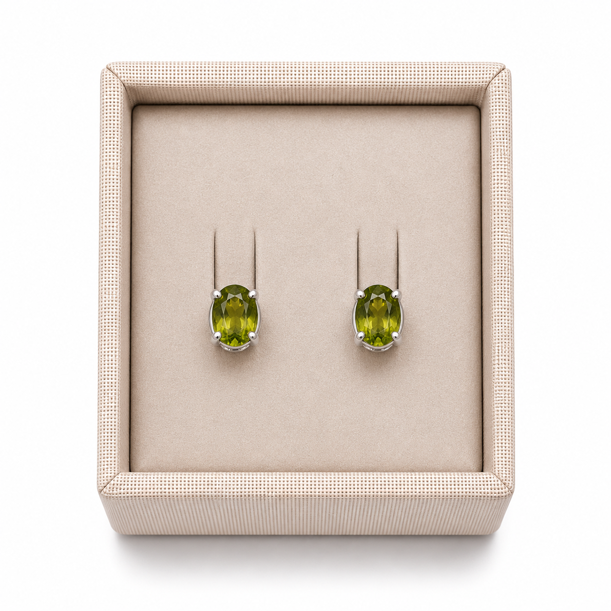 Peridot sterling silver earrings in a box displayed on a white background. -  Clover's Charm