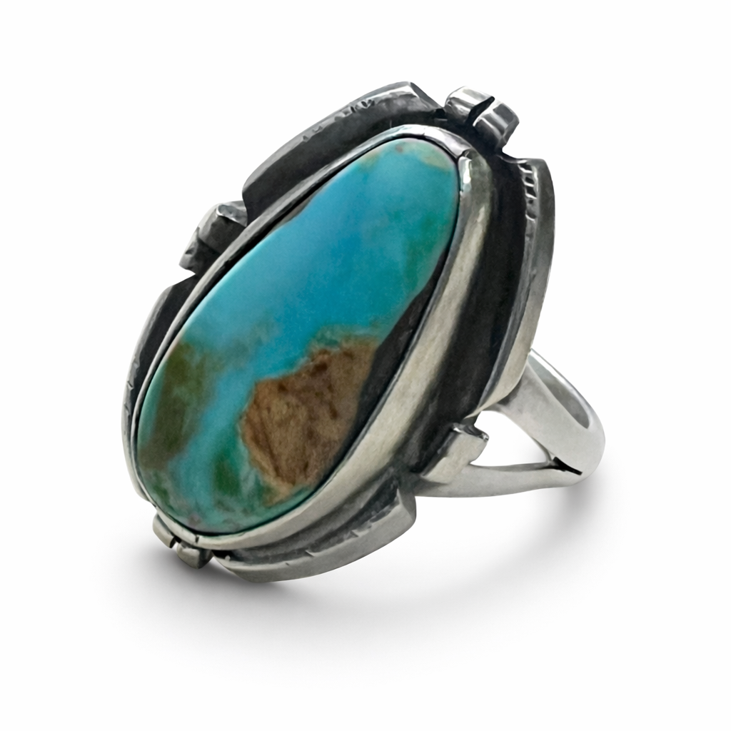 Randy Billy Turquoise ring with sterling silver band on a white background