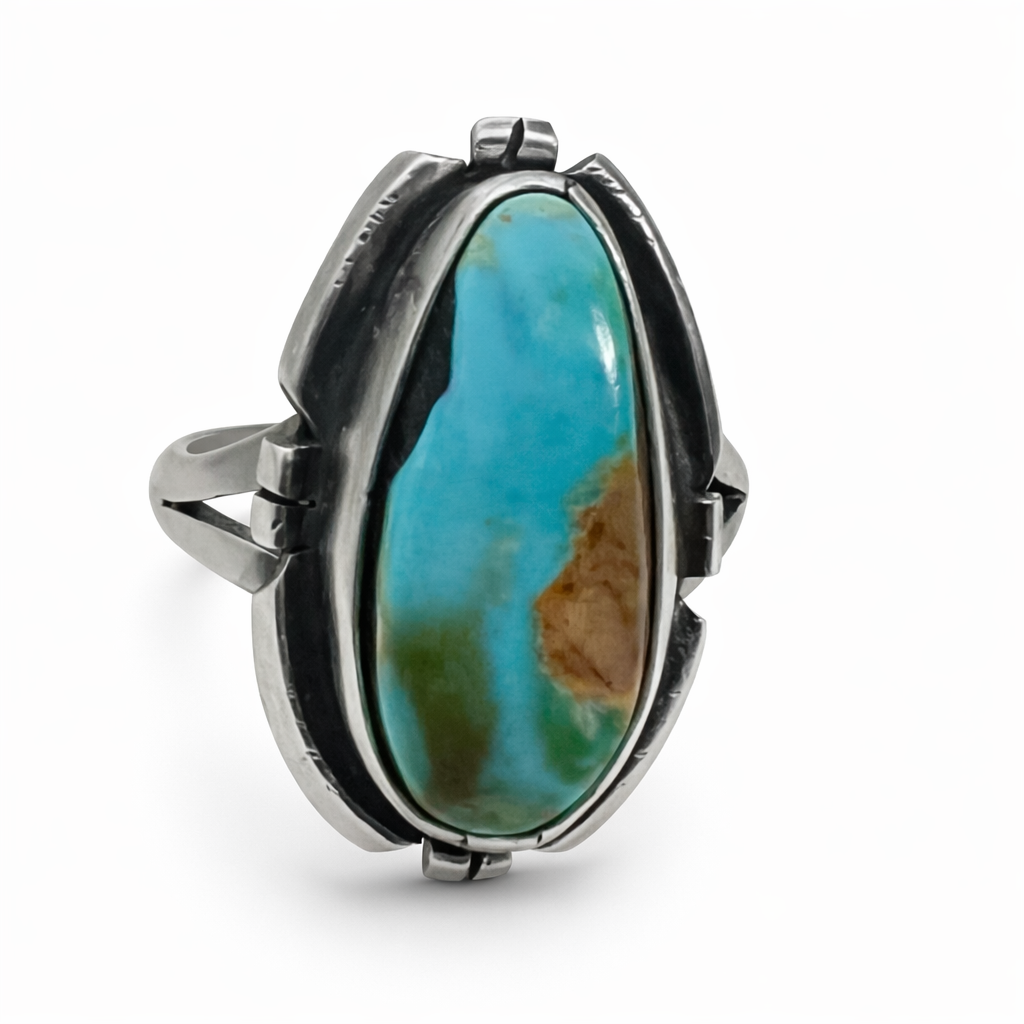 Randy Billy Turquoise ring with sterling silver setting on a white background