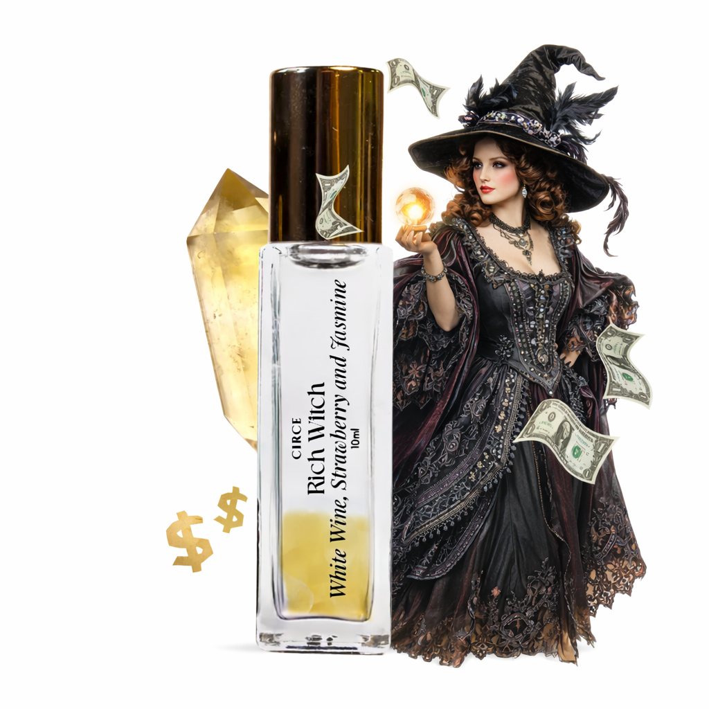 Perfume bottle labeled 'White Wine, Strawberries & Jasmine' next to a doll in a witch costume holding money. -Clover's Charm