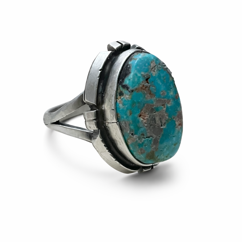 Randy Billy Turquoise ring with sterling silver band on a white background