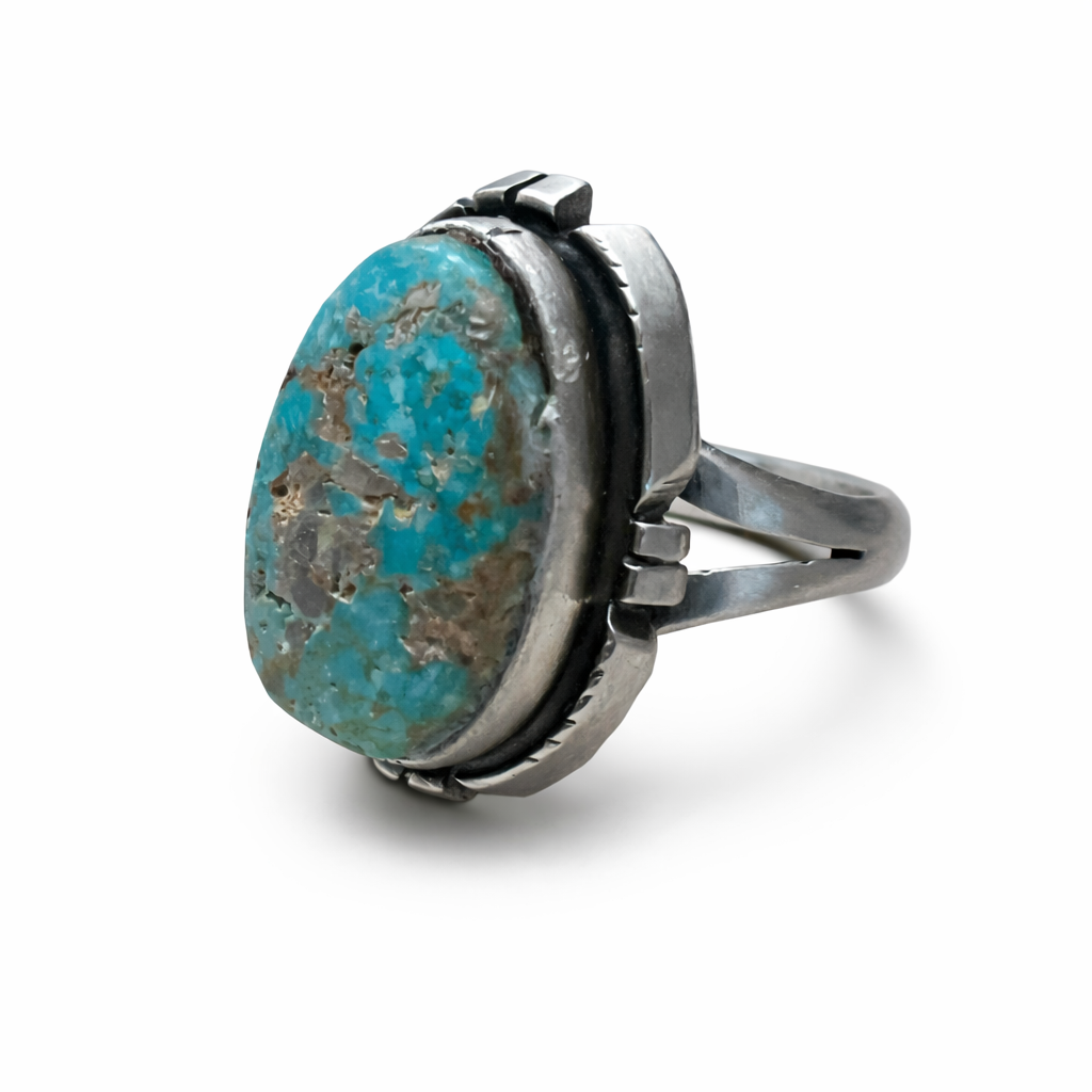 Randy Billy Turquoise stone ring with sterling silver band on a white background