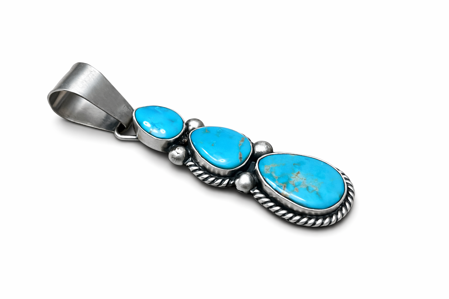 Sonoran Turquoise stone pendant on a white background. -Clover's Charm