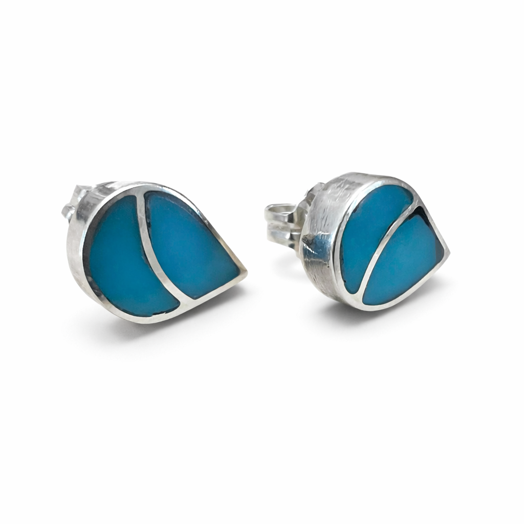 Pair of Zuni style  turquoise and sterling silver earrings on a white background. -Clover's Charm