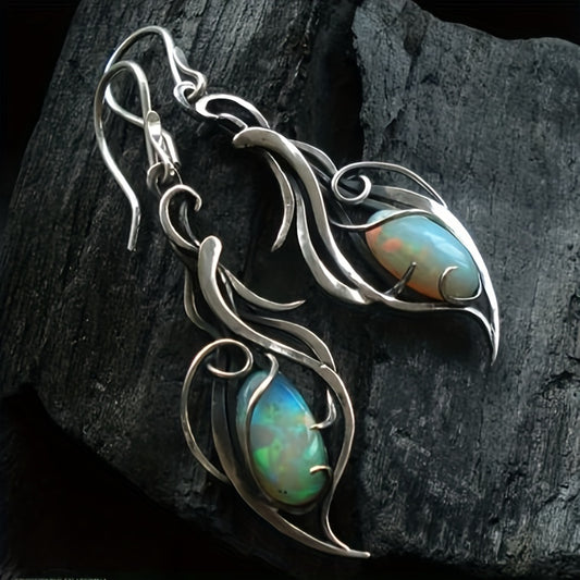 Silver-plated oval opal fire dangle earrings with flowing metal design 