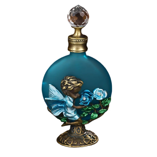 Vintage style blue rose glass perfume bottle with crystal stopper and decorative base on a white background.
