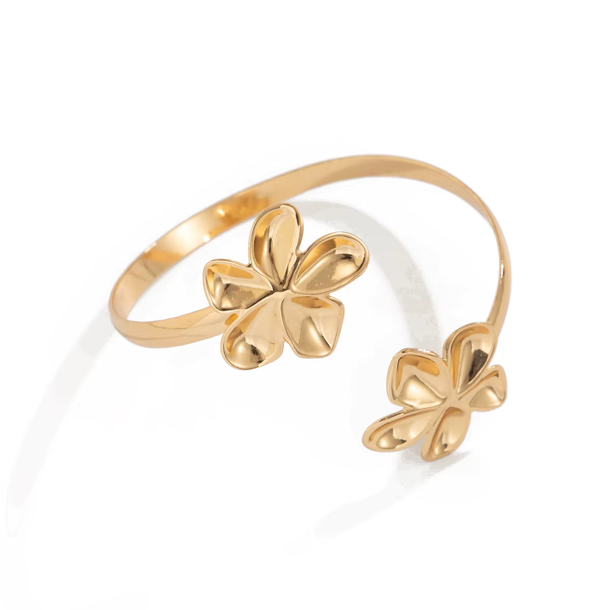 Vintage style gold flower open cuff bracelet close up showing floral details