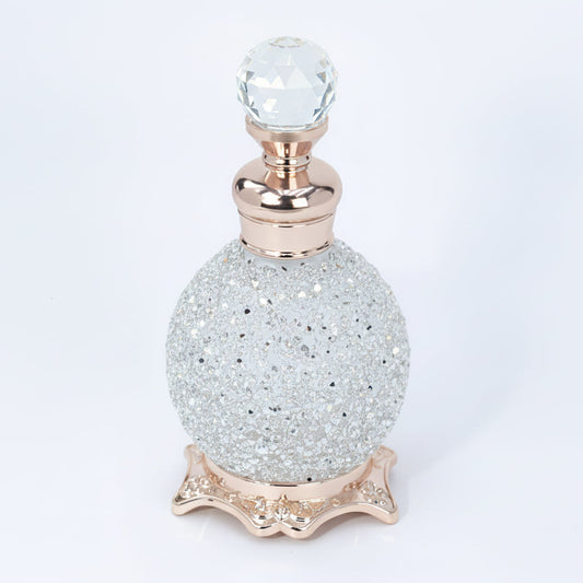 15ml Vintage style rhinestone glass perfume bottle with crystal style stopper and decorative base on a white background
