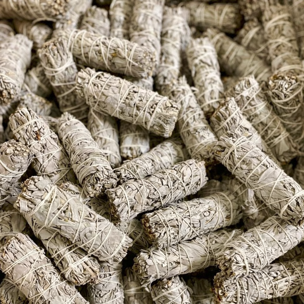 Close-up of bundled sage smudge sticks - Clover's Charm