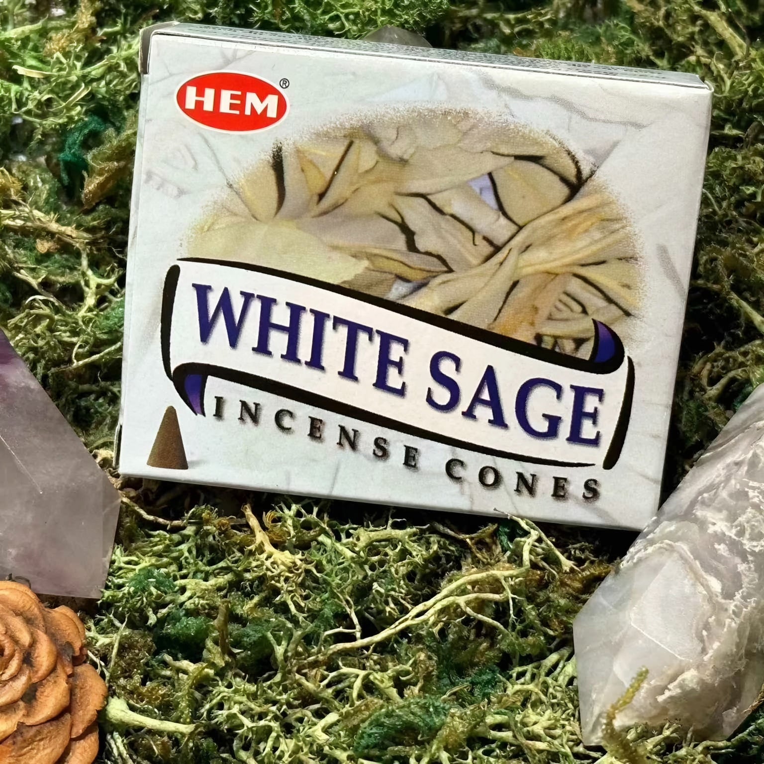 HEM brand white sage incense cones on a mossy display with crystals. - Clover's Charm