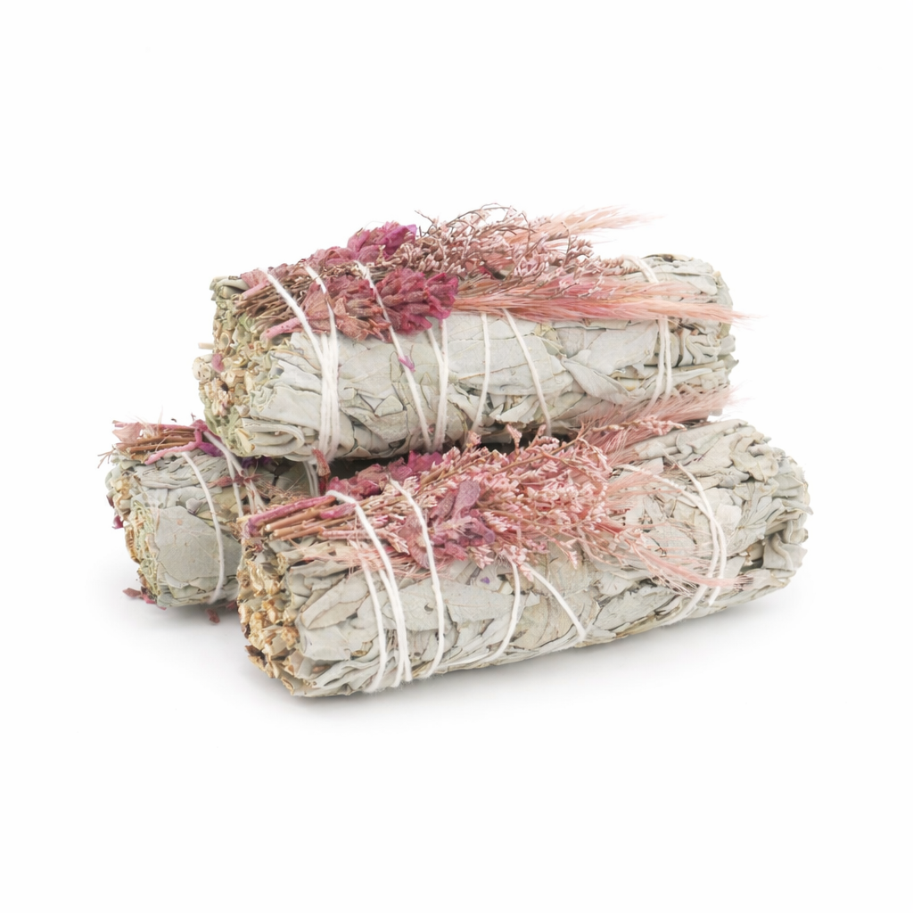 Three bundles of sage smudge sticks with pink and white ribbons on a white background - Clover's Charm